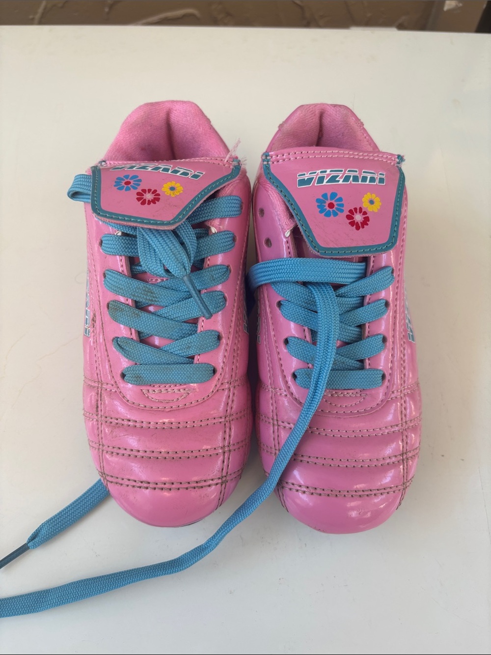 Kids Pink Athletic cleats with Blue Laces